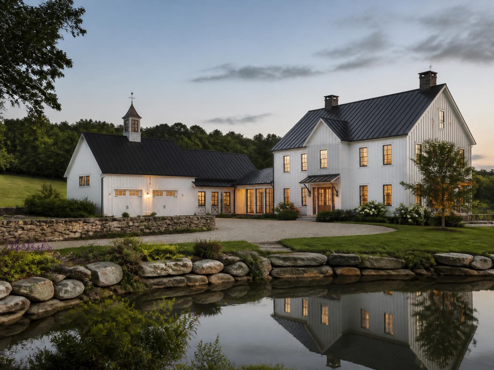 Farmhouse and barn compound with pond in the Massachusetts countryside
